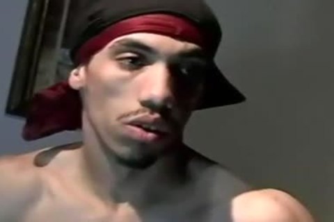 Tattooed chap Solo jerking off