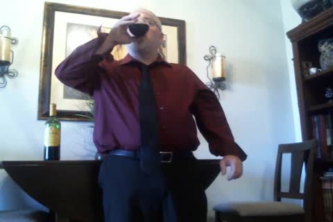 mature Suit disrobe (with Red Wine!)