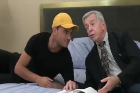fashionable old Grey Haired American Teacher And His Student