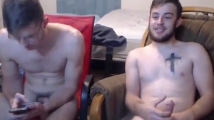 Two dudes Jerking And Cumming Onto The Glass Desk
