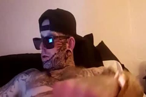chap Full Of Tattoo Masturbating With A Fleshlight