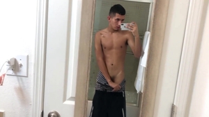 BarebackLatinoz - Roman wearing shorts stroking in bath